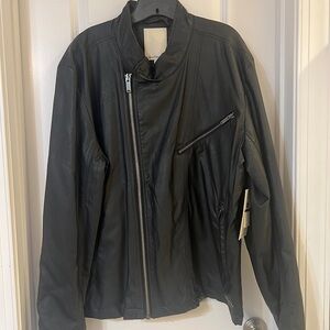 NWT attached. Never worn. Unisex/Mens XXL Calvin Klein faux leather jacket.